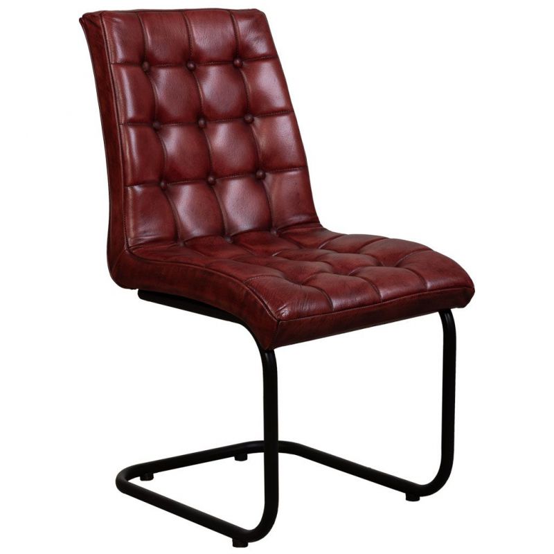 silla tapizada en piel rojo